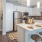 kitchen area with large spaces around kitchen island and ample counter-space