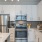 kitchen area with large spaces around kitchen island and ample counter-space