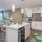 kitchen island  with ample space and easy access to living area