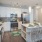 kitchen island  with ample space and easy access to living area