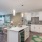 Ample lighting and kitchen island at Ridgelake Apartments in Sarasota, FL